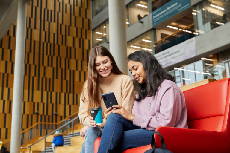 Students looking at their phones